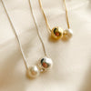 Smooth sphere and pearl necklace pendant - Lua and Mar